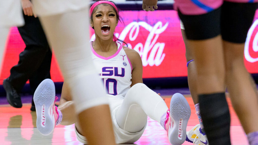 Angel Reese fierce basketball court reaction showing energy determination intense game wallpaper