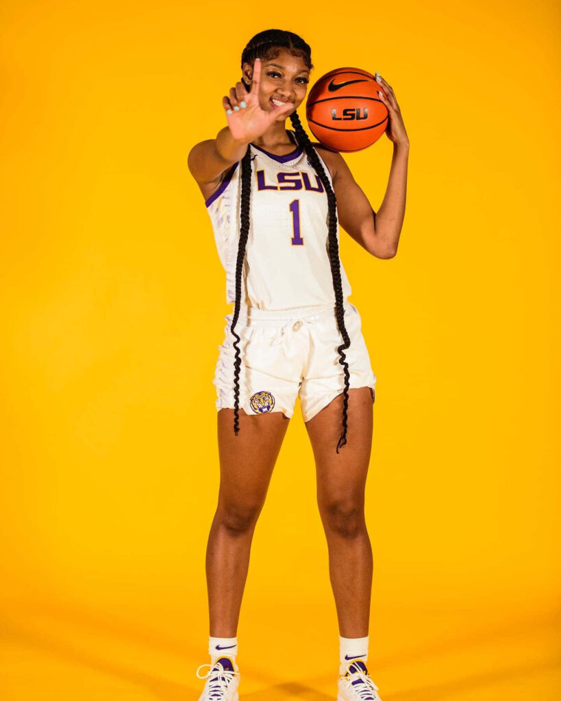 Angel Reese in LSU basketball uniform holding ball on vibrant yellow background dynamic energy wallpaper