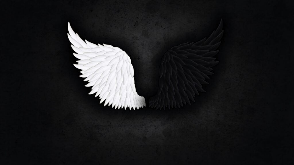 White and black angel wings on textured dark background symbolizing light and darkness balance Wallpaper