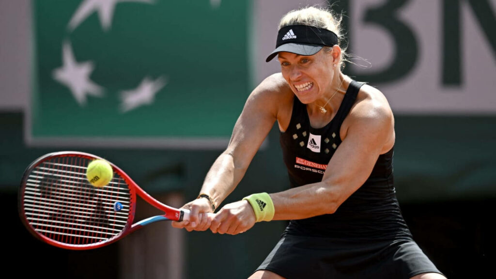 Angelique Kerber focused returning tennis shot showing fierce competitive spirit on court wallpaper