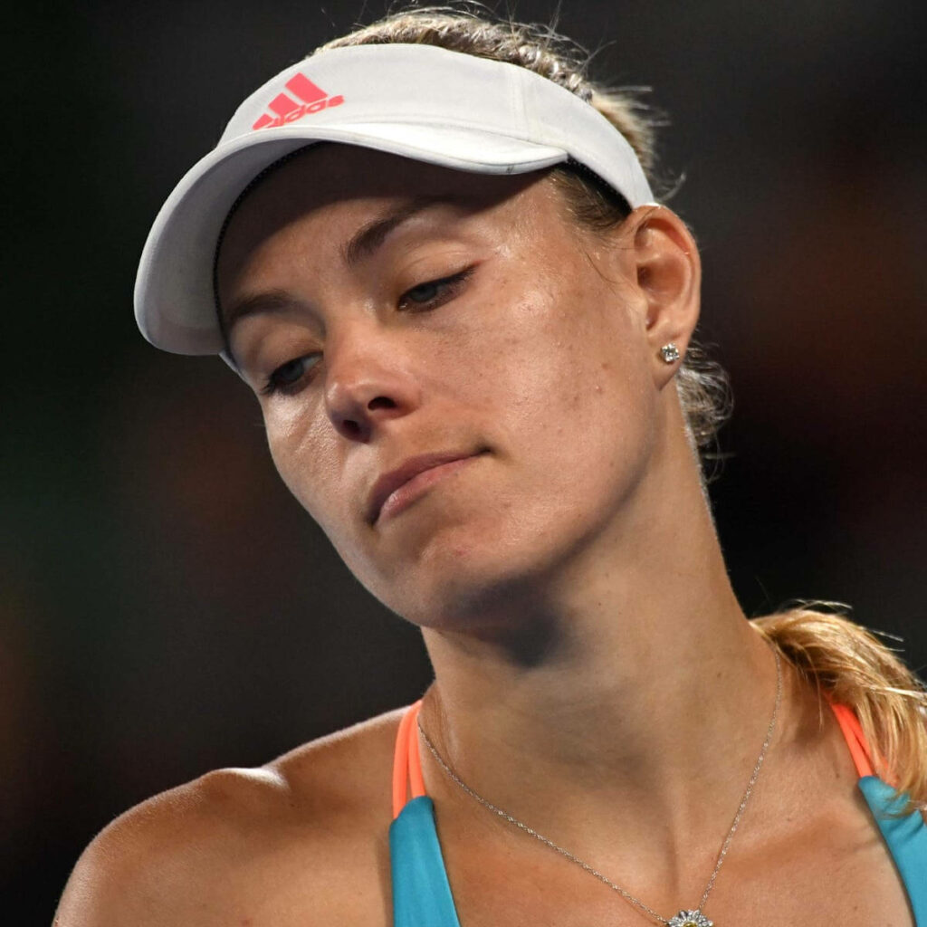 Angelique Kerber focused tennis player portrait high resolution wallpaper competitive spirit