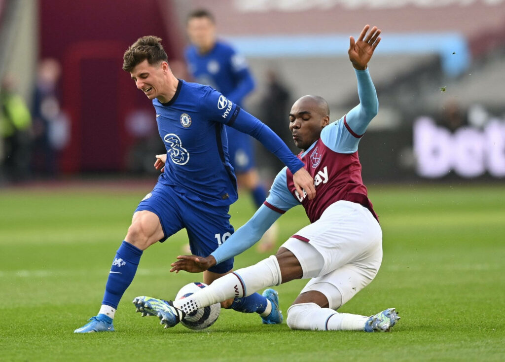 Angelo Ogbonna powerful football defensive tackle showcasing skill and strength in match wallpaper