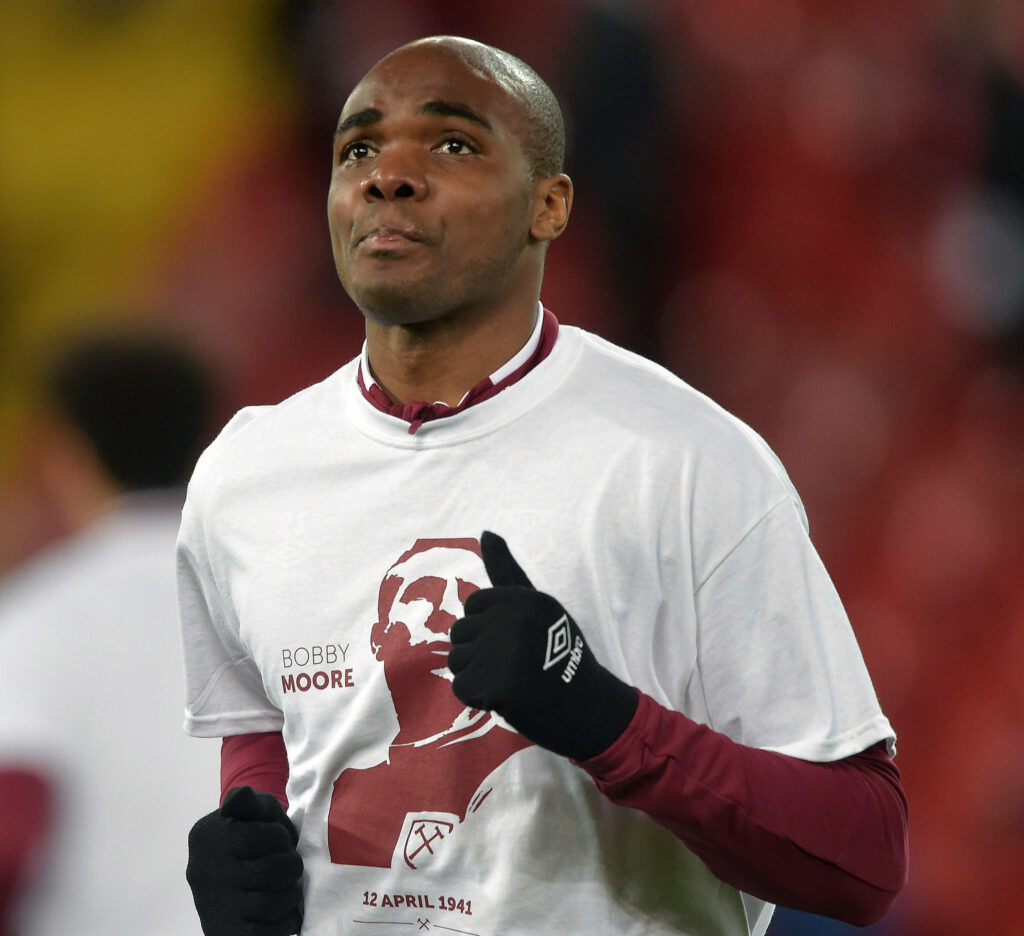Angelo Ogbonna wearing tribute shirt honoring football legend Bobby Moore wallpaper background