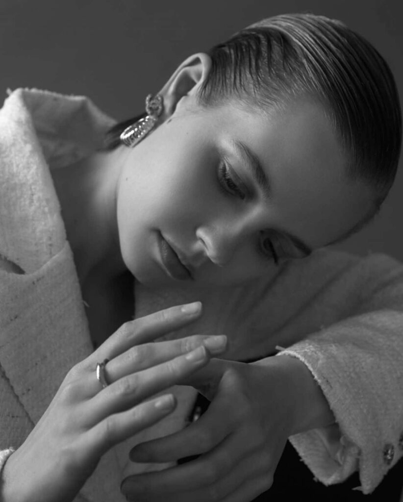 Angourie Rice elegant black and white portrait wallpaper showcasing refined style and grace