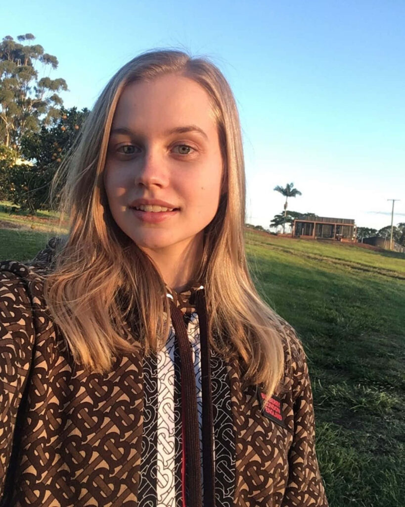 Angourie Rice selfie at sunset golden light peaceful outdoor background serene portrait wallpaper