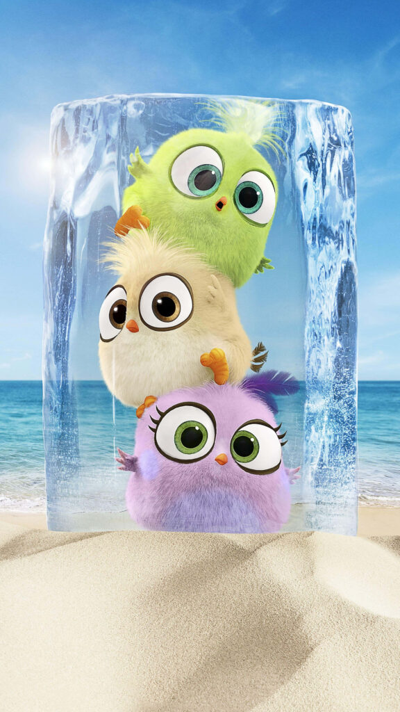 Angry Birds Hatchlings stacked in clear ice block on sunny beach with blue sky and ocean waves Wallpaper