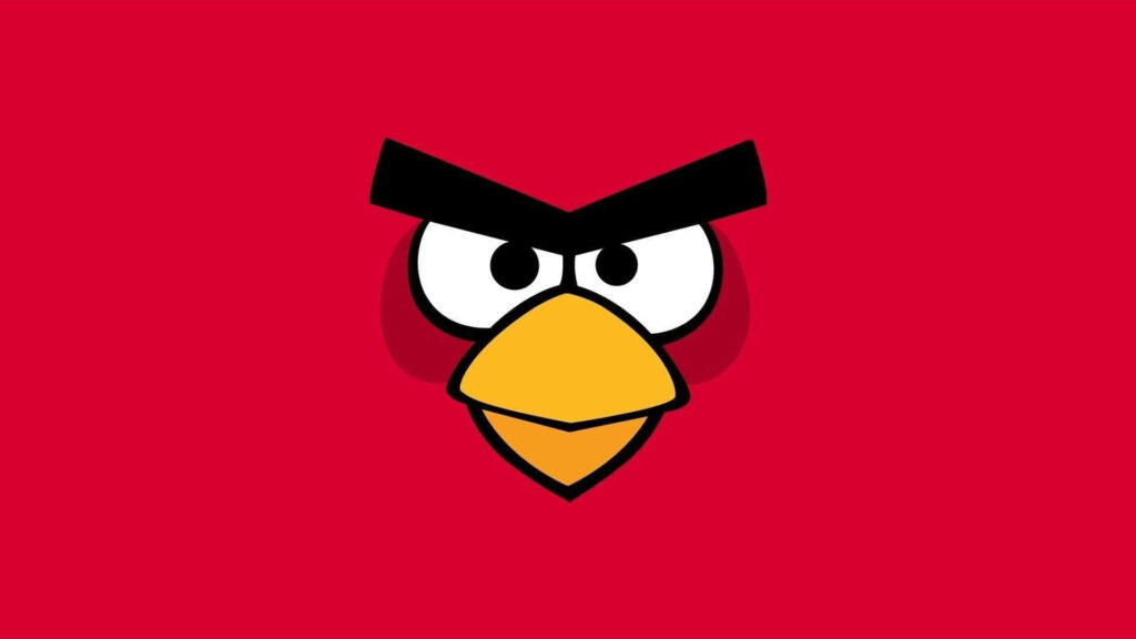 Angry Birds Red character face wallpaper with bold red background and determined expressive eyes