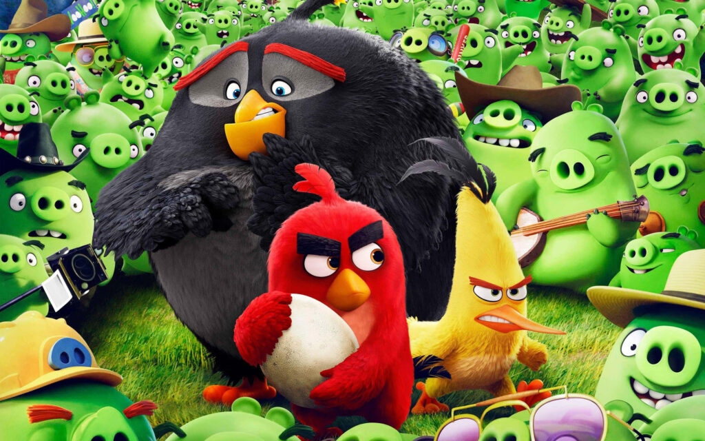 Angry Birds wallpaper with Red Chuck Bomb vs mischievous Green Pigs intense playful rivalry