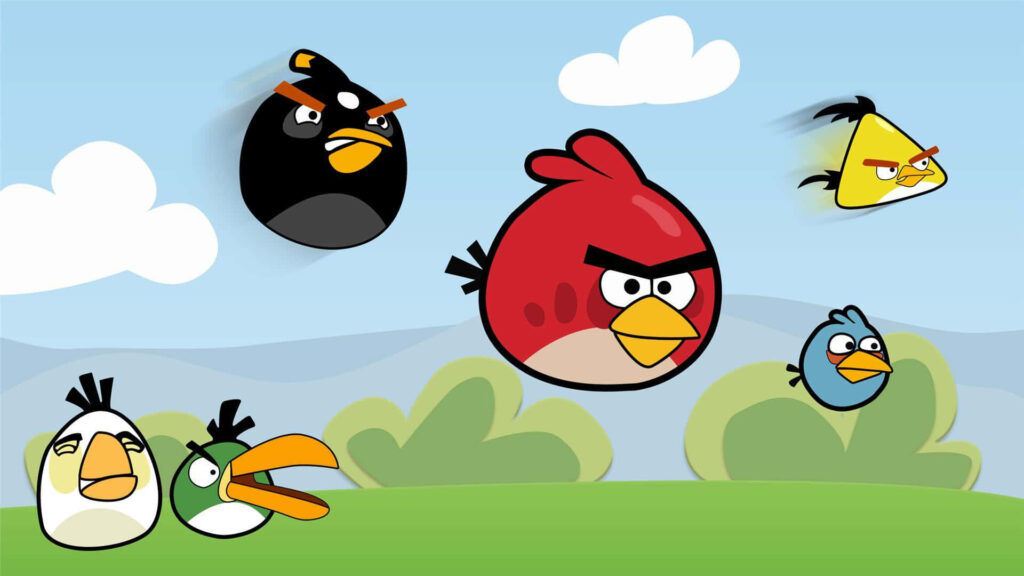 Angry Birds characters flying and standing outdoors with blue sky and fluffy clouds background Wallpaper