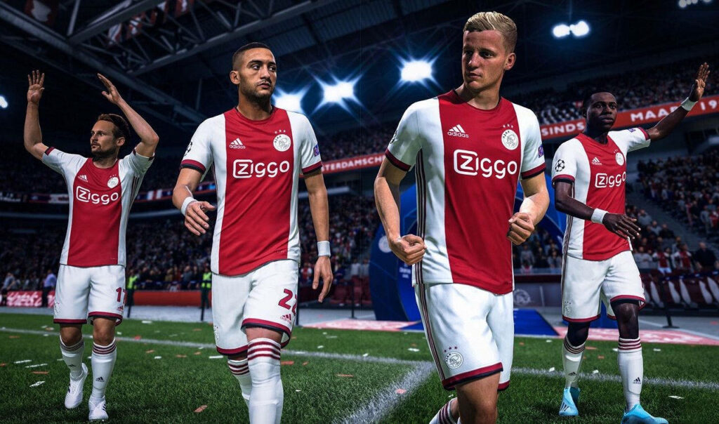 Vibrant FIFA Ajax Players Wallpaper: Energetic Stadium Scene