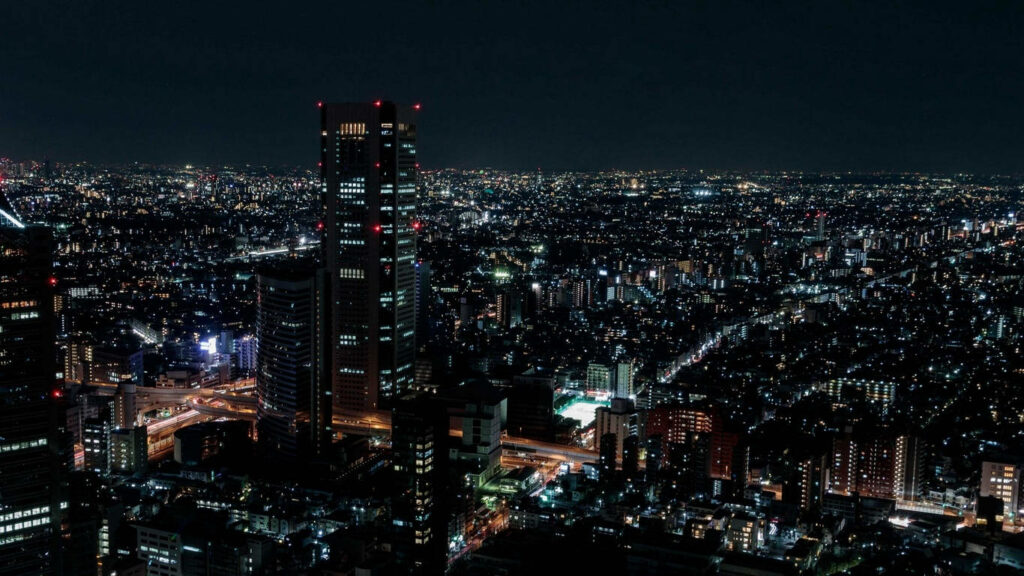 Immerse Yourself in the Enchanting Anime Night Cityscape Wallpaper