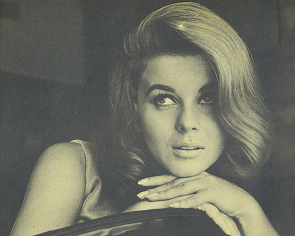 Closeup of Swedish American celebrity Ann-Margret showcasing glamorous timeless beauty wallpaper