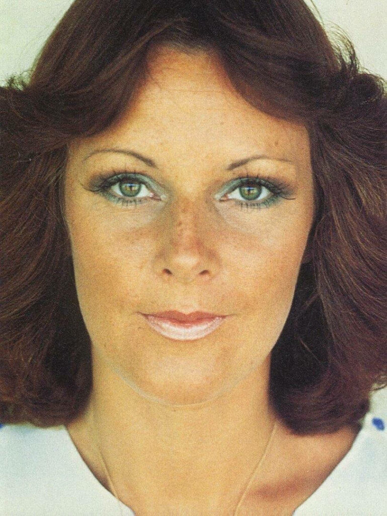 Anni-Frid Lyngstad ABBA vibrant wallpaper iconic style classic music fan background image