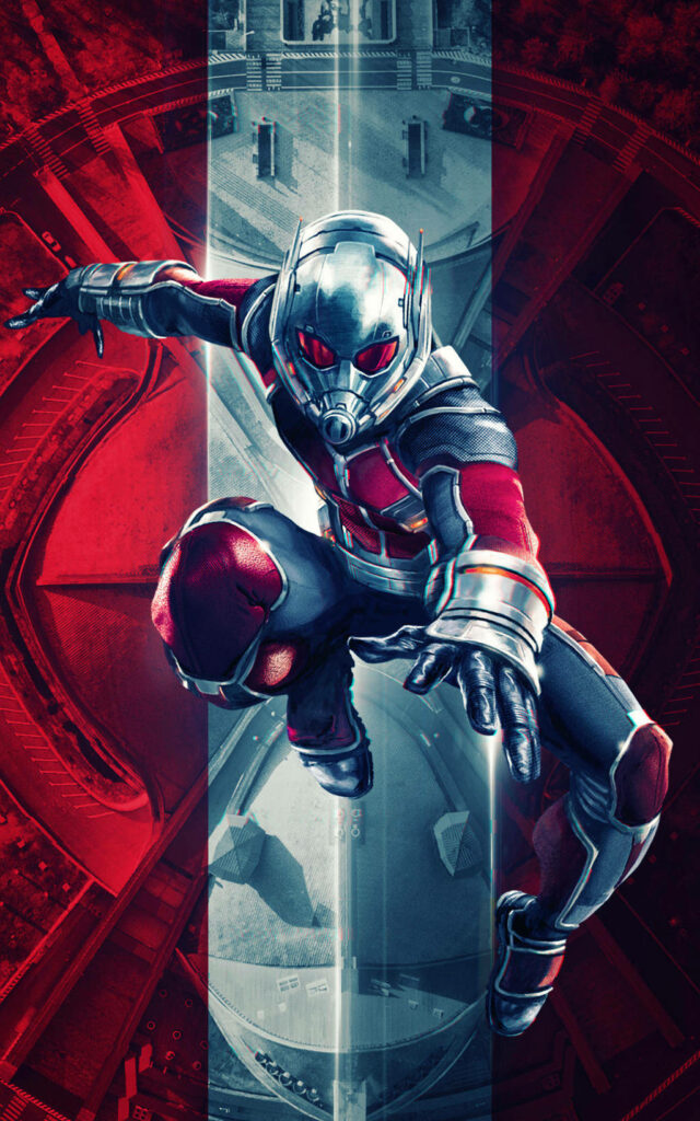 Ant Man mid-air leap with dynamic red silver background showcasing superhero power and agility Wallpaper