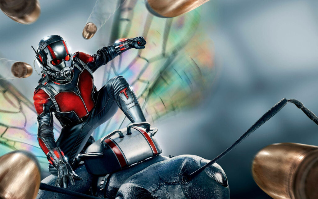 Ant-Man riding giant ant dodging bullets mid-air showcasing heroic agility wallpaper background