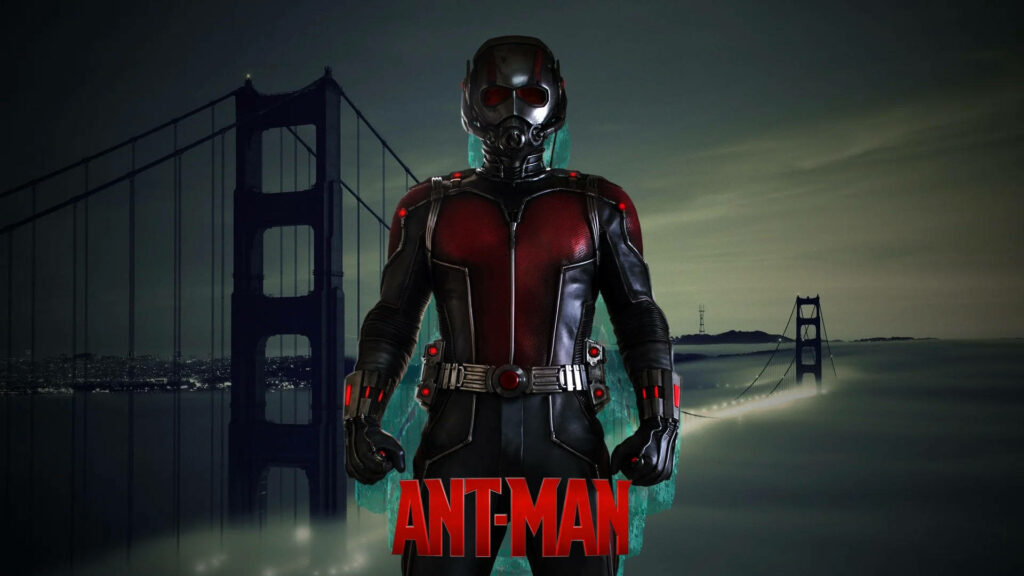 Ant-Man Takes Center Stage: Paul Rudd as the Superhero Standing Strong Against a Striking Bridge Wallpaper