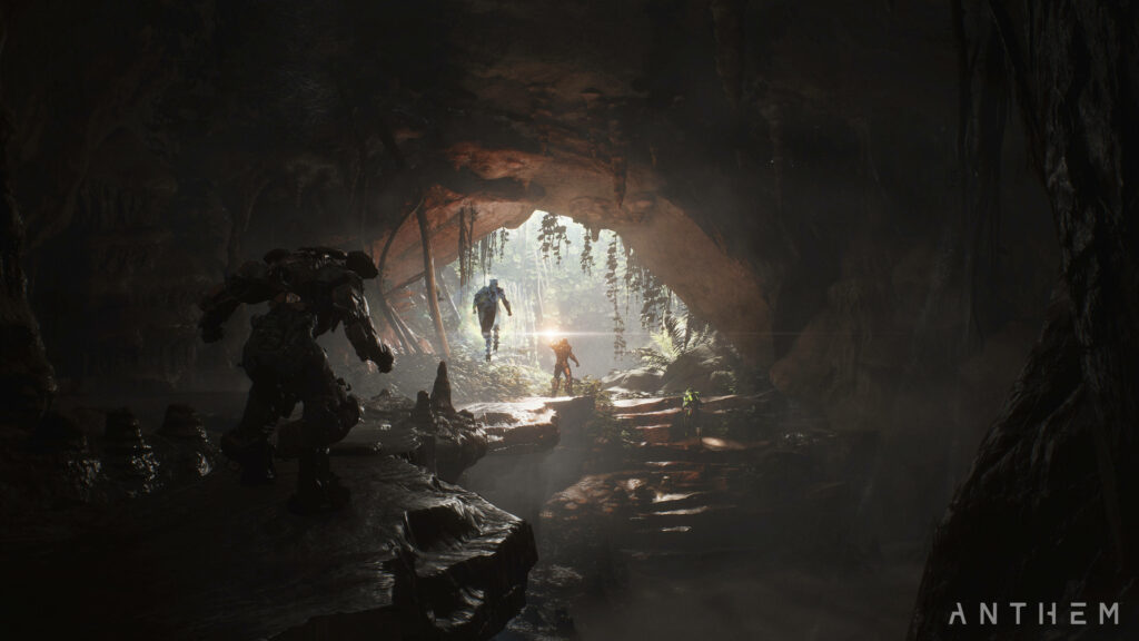 4K Anthem wallpaper showing Javelins exploring a shadowy cave with sunlight streaming in