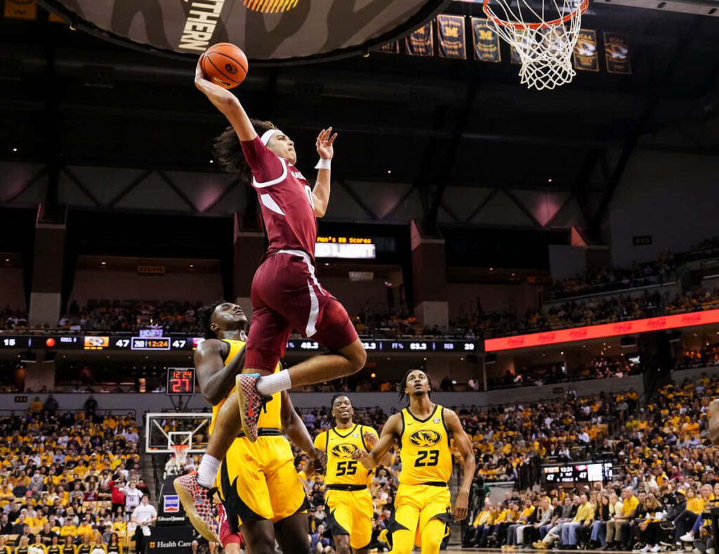 Anthony Black basketball layup action shot showcasing athleticism and intense game moment wallpaper