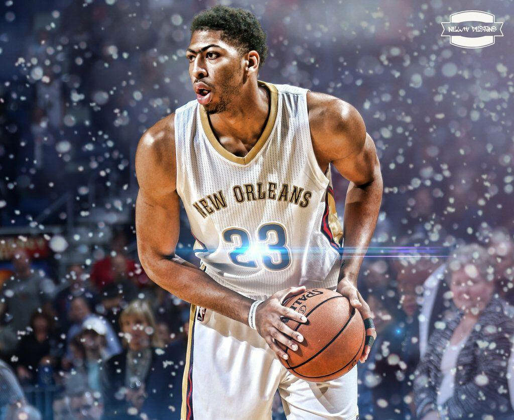 Anthony Davis in New Orleans Pelicans jersey focused during a dynamic basketball game action shot Wallpaper