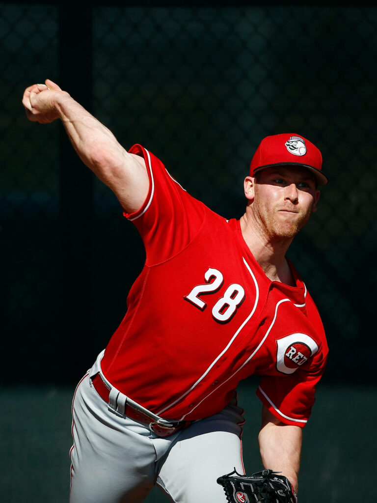 Anthony DeSclafani intense pitching pose in red Cincinnati Reds uniform baseball wallpaper