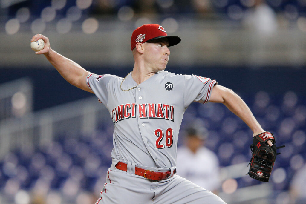 Anthony DeSclafani pitching with intense focus dynamic baseball wallpaper background