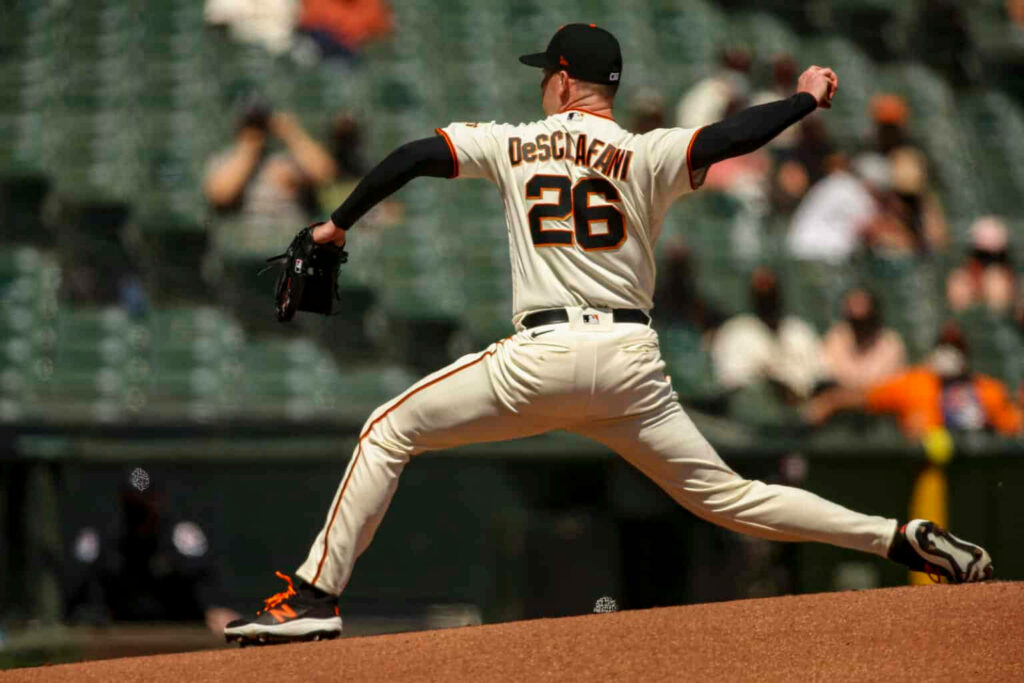 Anthony DeSclafani pitching with focused form on mound dynamic baseball wallpaper background