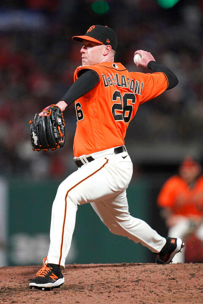Anthony DeSclafani pitching with focus and power on the mound during a baseball game wallpaper