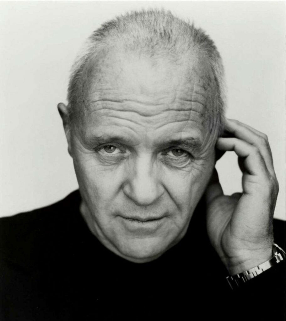 Black and white wallpaper of Anthony Hopkins with a contemplative expression and deep character