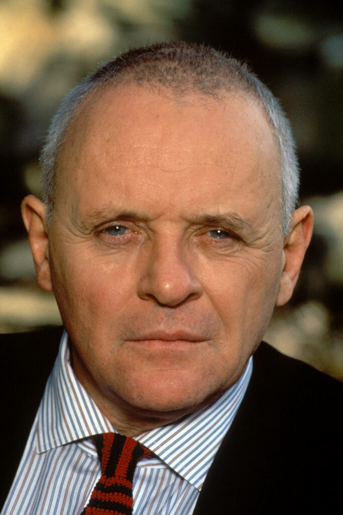 Portrait of Anthony Hopkins with intense gaze and commanding presence for bold wallpaper background