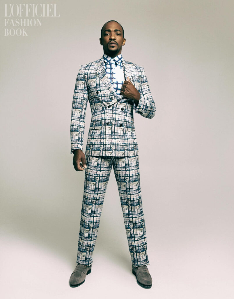 Anthony Mackie in patterned suit posing confidently for LOfficiel Fashion minimalist wallpaper background