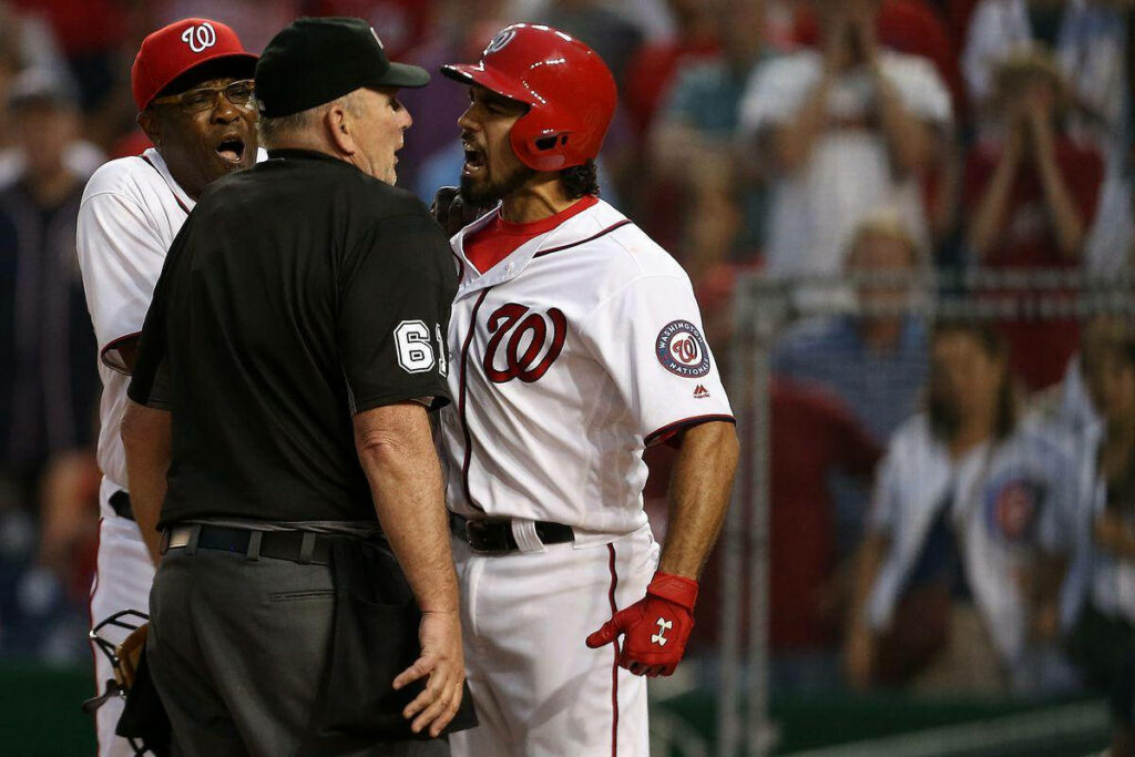 Anthony Rendon arguing with referee intensely during baseball game dynamic wallpaper background