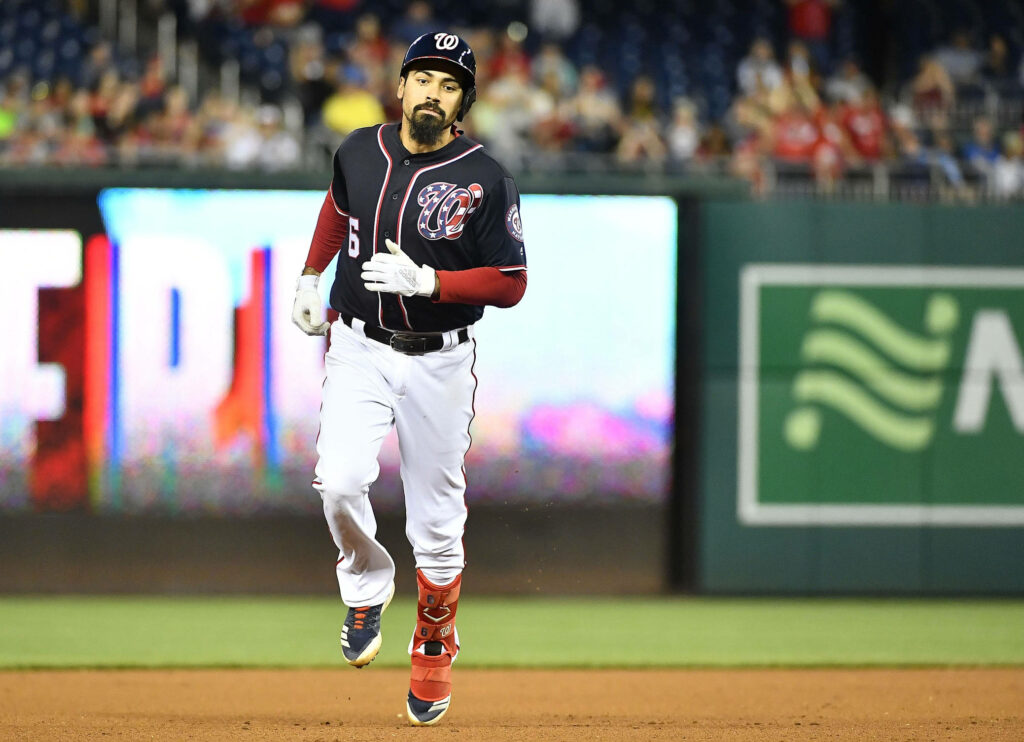Anthony Rendon running in Washington Nationals uniform on baseball field game action wallpaper