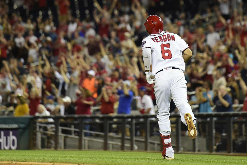 Anthony Rendon sprinting in jersey number 6 with cheering crowd at baseball game wallpaper background