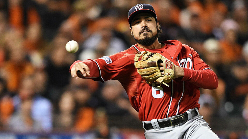 Anthony Rendon throwing baseball in red Washington Nationals uniform dynamic sports wallpaper