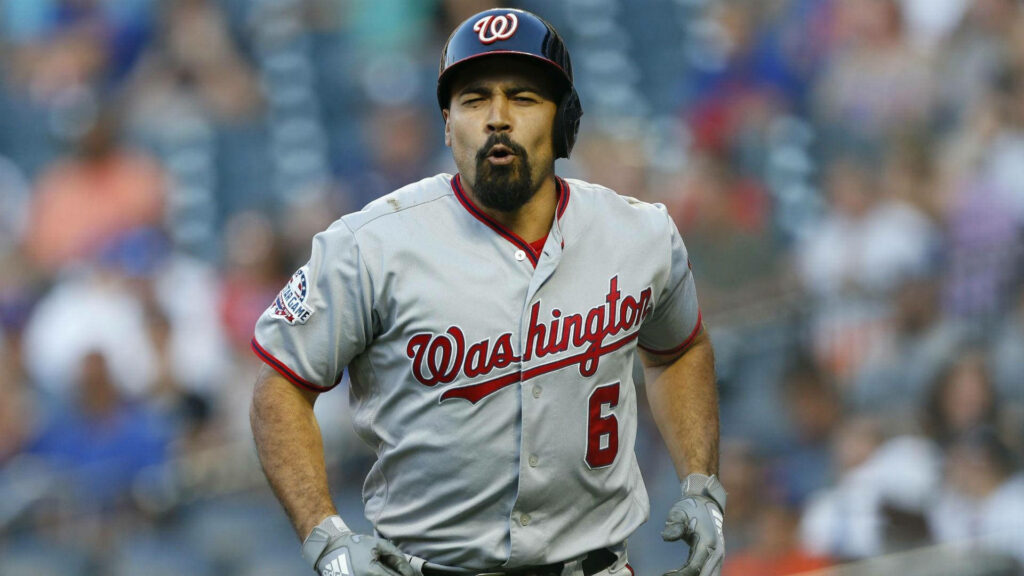 Anthony Rendon in Washington Nationals uniform running with focus and athleticism on field wallpaper