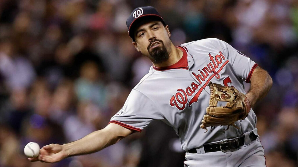 Anthony Rendon catching baseball during Washington Nationals game showing focus and skill Wallpaper