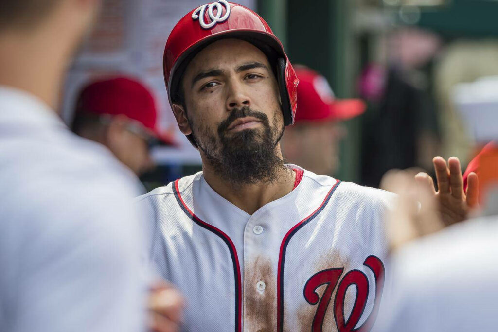 Anthony Rendon in Washington Nationals uniform relaxed in dugout candid baseball wallpaper background