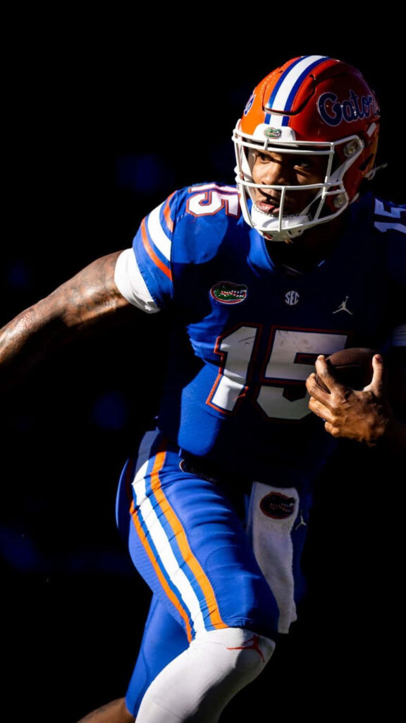 Anthony Richardson Florida Gators quarterback in action intense focus athleticism wallpaper background