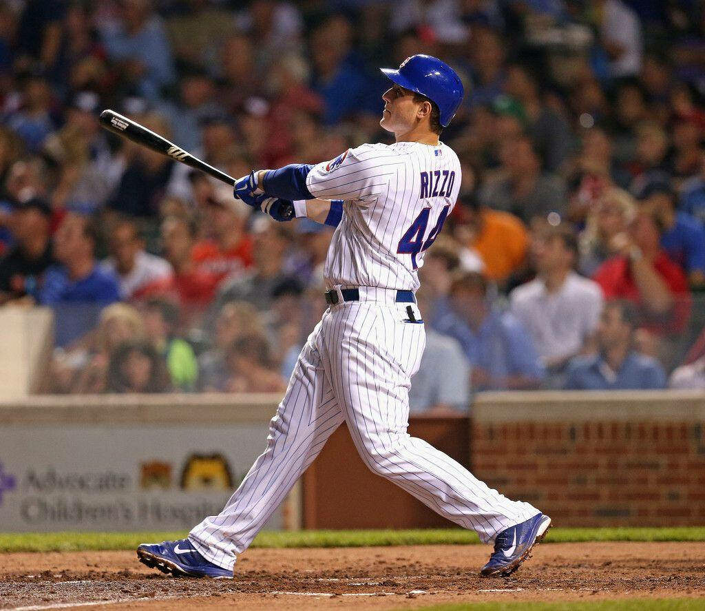 Anthony Rizzo Mid-Swing: Dynamic Baseball Wallpaper Background