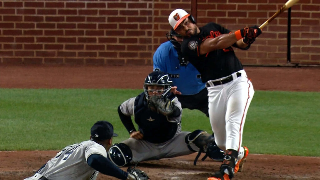 Anthony Santander swinging bat intense focus Major League Baseball dynamic wallpaper background