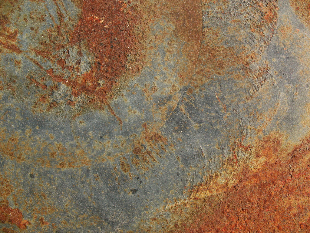 Antique Rusty Metal Texture: Warm Orange & Brown Wallpaper Background