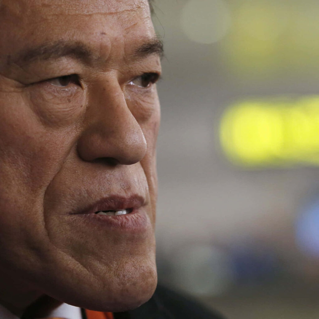 Close-up of Antonio Inoki intense expression detailed face wallpaper background image
