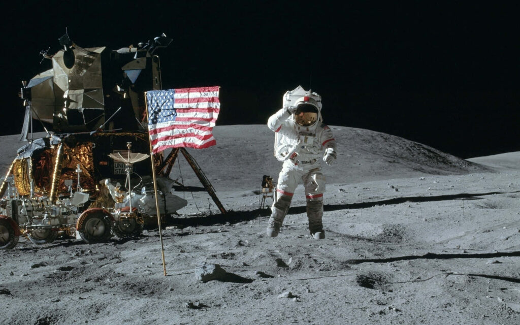 Apollo 11: Neil Armstrong on the Moon with Flag - Wallpaper Background