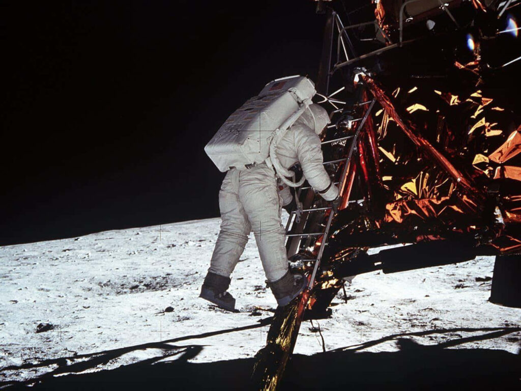 Neil Armstrong Descends Apollo Lunar Module - Iconic Moon Landing Wallpaper