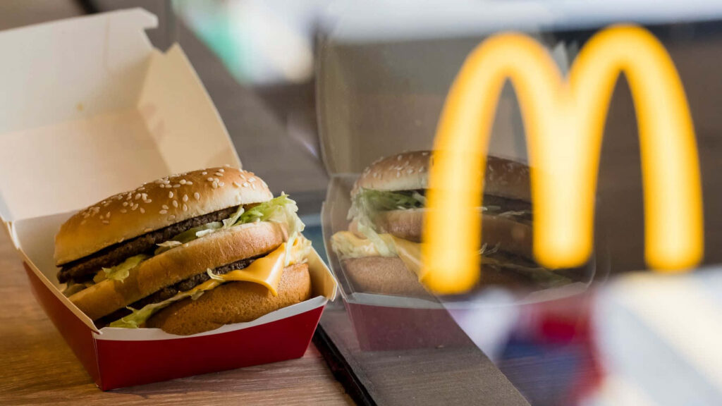 Delectable McDonald's Burger with Layers: Tasty Wallpaper Background