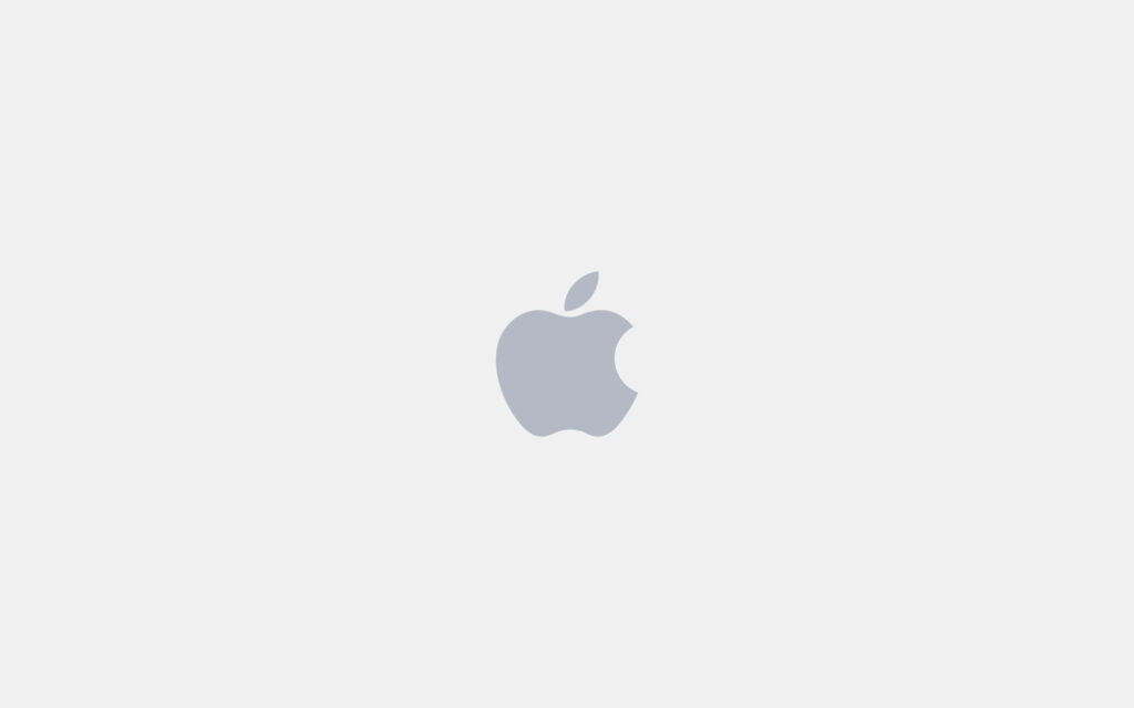 Minimalist Apple logo wallpaper with iconic bitten apple on clean light grey background