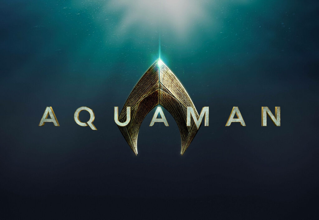 Aquaman wallpaper with glowing trident symbol and bold logo against deep ocean background