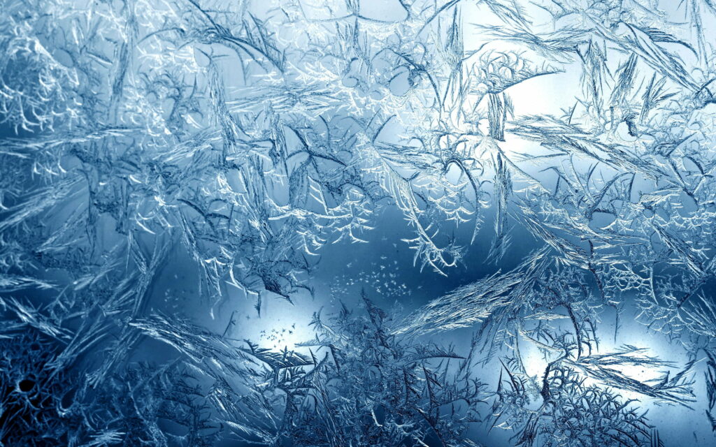 Arctic Symphony: A Captivating Macro Exploration of Frozen Water's Beauty Wallpaper