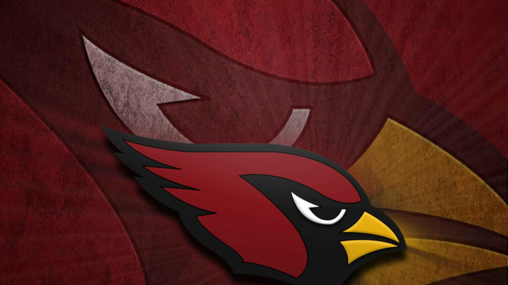 Arizona Cardinals bold bird logo on textured red background showcasing fierce NFL spirit wallpaper