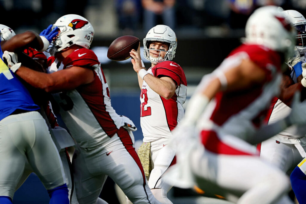 Arizona Cardinals Quarterback: Ready to Launch the Ball in Stunning HD- Football Players in Action Wallpaper in UHD 4K 3600x2400 Resolution